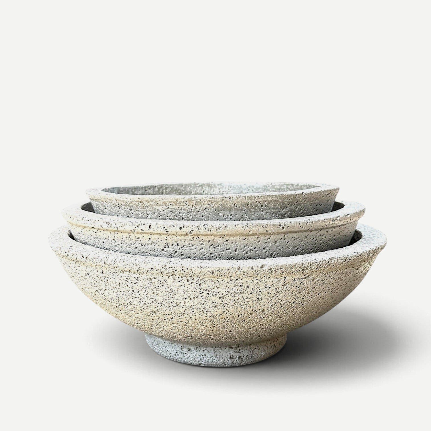 Hawaiian Discovery Furniture round bonsai planters in a nested set, made from lightweight concrete and foam.