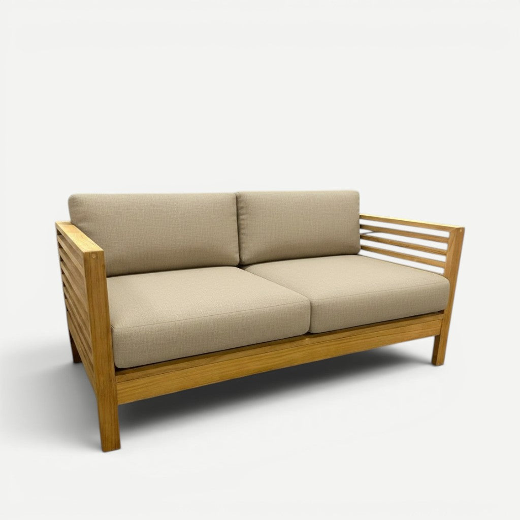 Hawaiian Discovery Furniture Summer Teak Loveseat with honey-colored wood frame and beige outdoor cushions