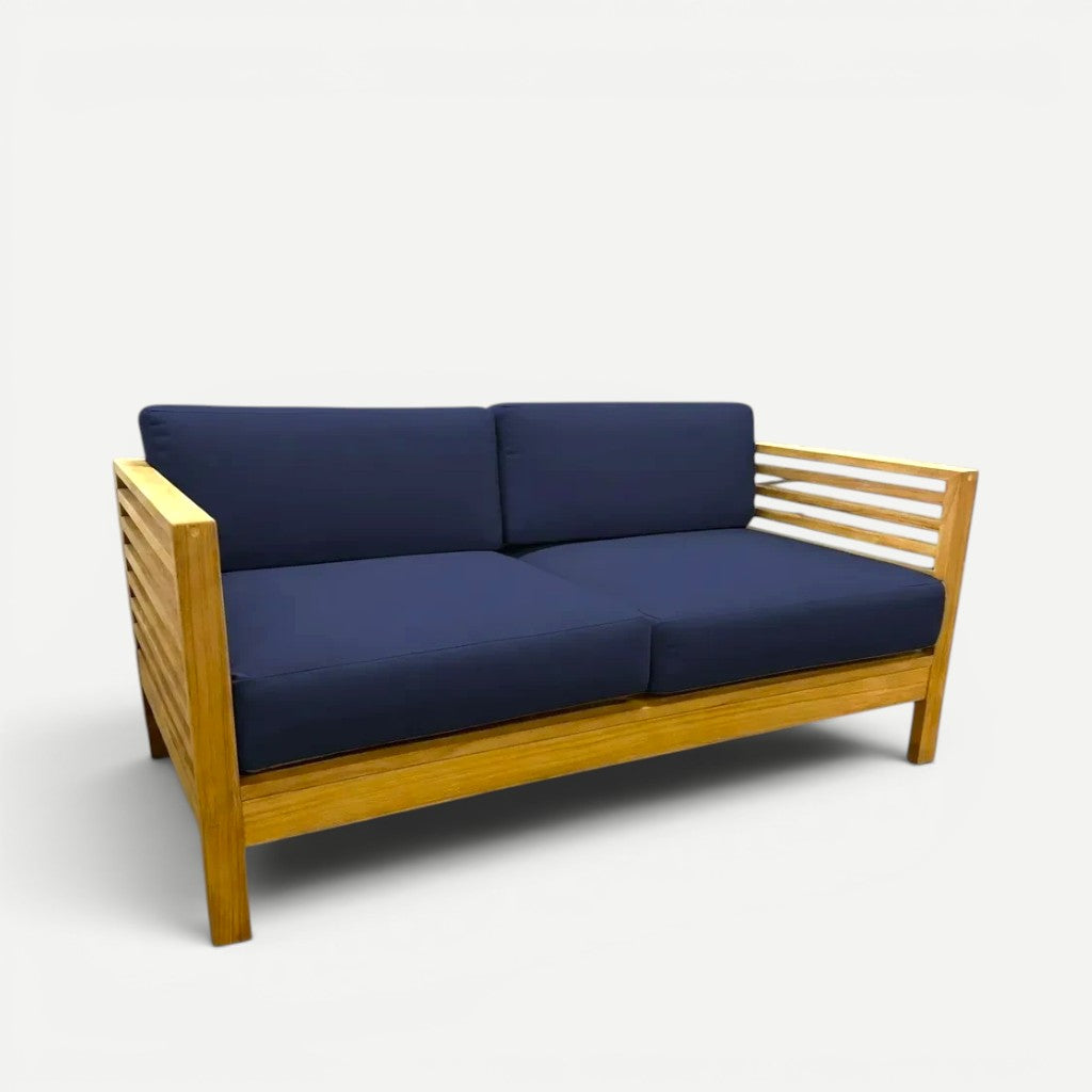 Hawaiian Discovery Furniture Summer Teak Loveseat with natural honey-colored wood frame and navy blue cushions