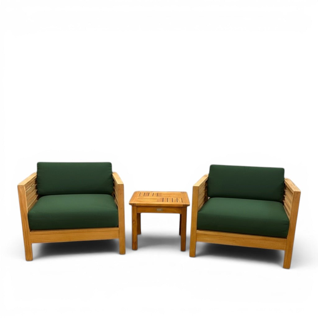 Hawaiian Discovery Furniture Summer small area set with two teak club chairs and a side table featuring green cushions.