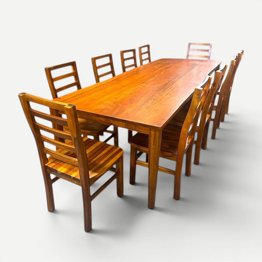 Hawaiian Discovery Furniture Molokai 10-seater dining table set made from natural acacia hardwood with slatted chairs.
