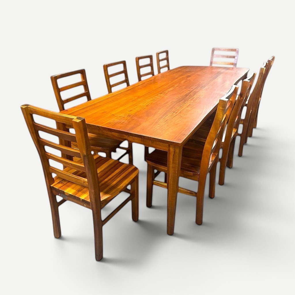 Hawaiian Discovery Furniture Molokai 10-seater dining table set made from natural acacia hardwood with slatted chairs.