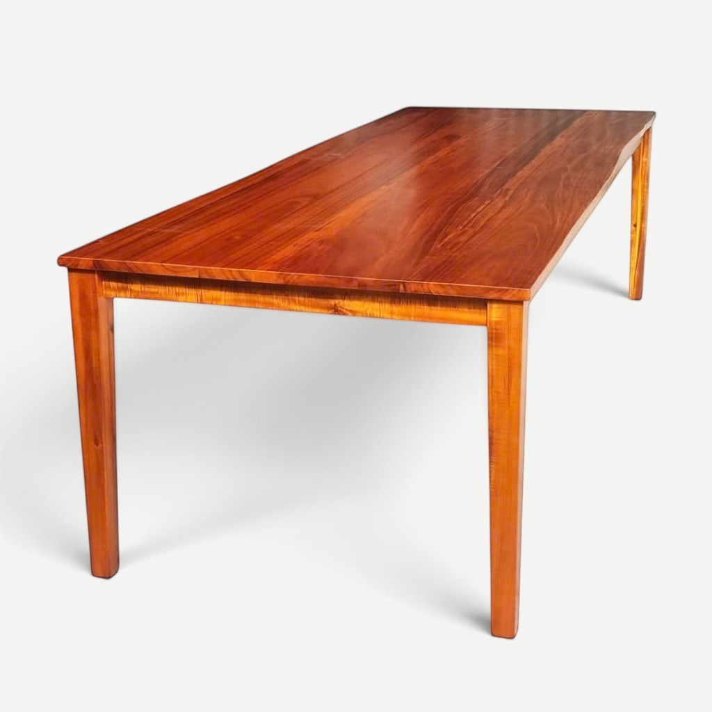 Hawaiian Discovery Furniture Molokai 10-seater dining table crafted from rich brown plantation-grown Acacia hardwood.