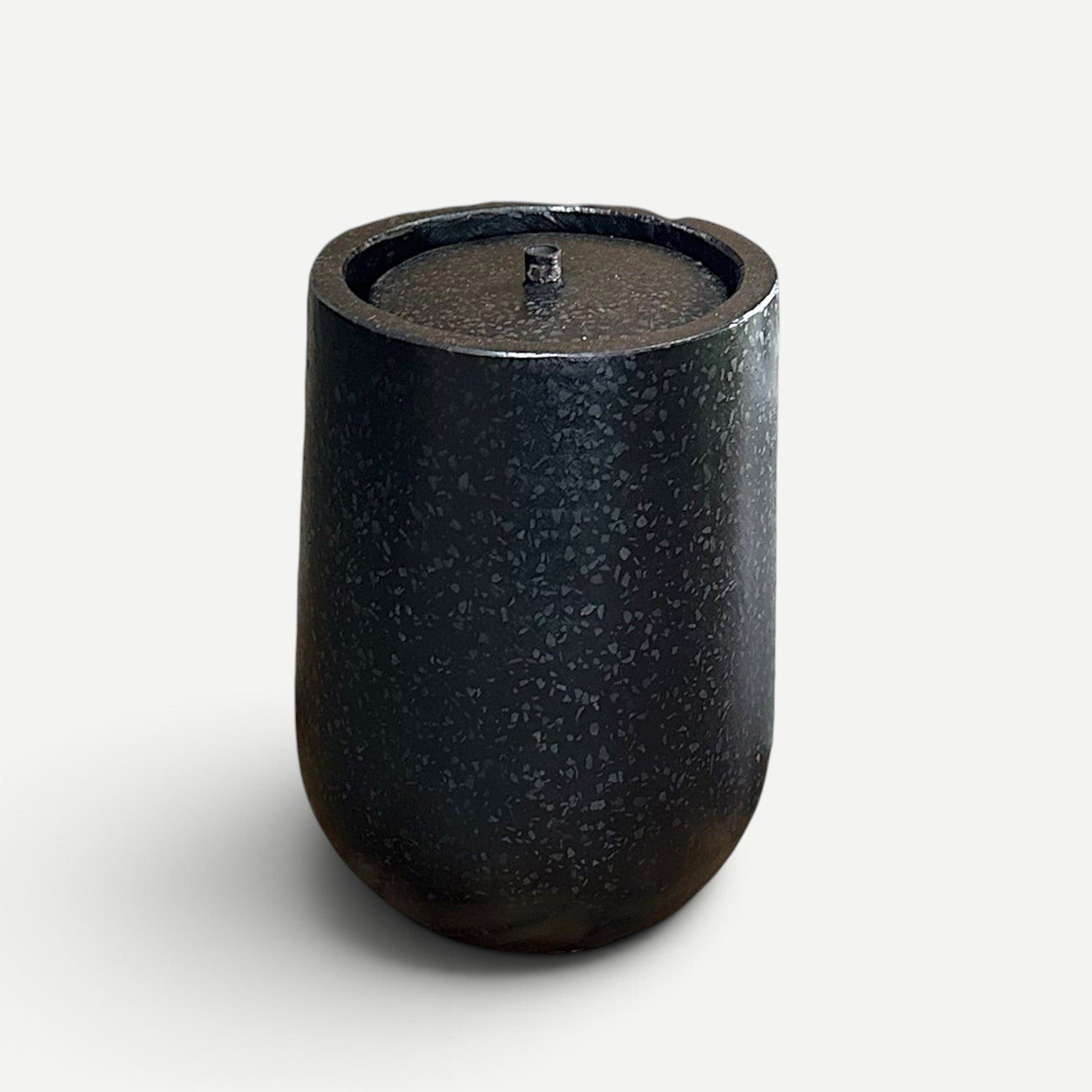 Hawaiian Discovery Furniture Bordeaux cement fountain in a sleek black speckled finish for indoor or outdoor use.