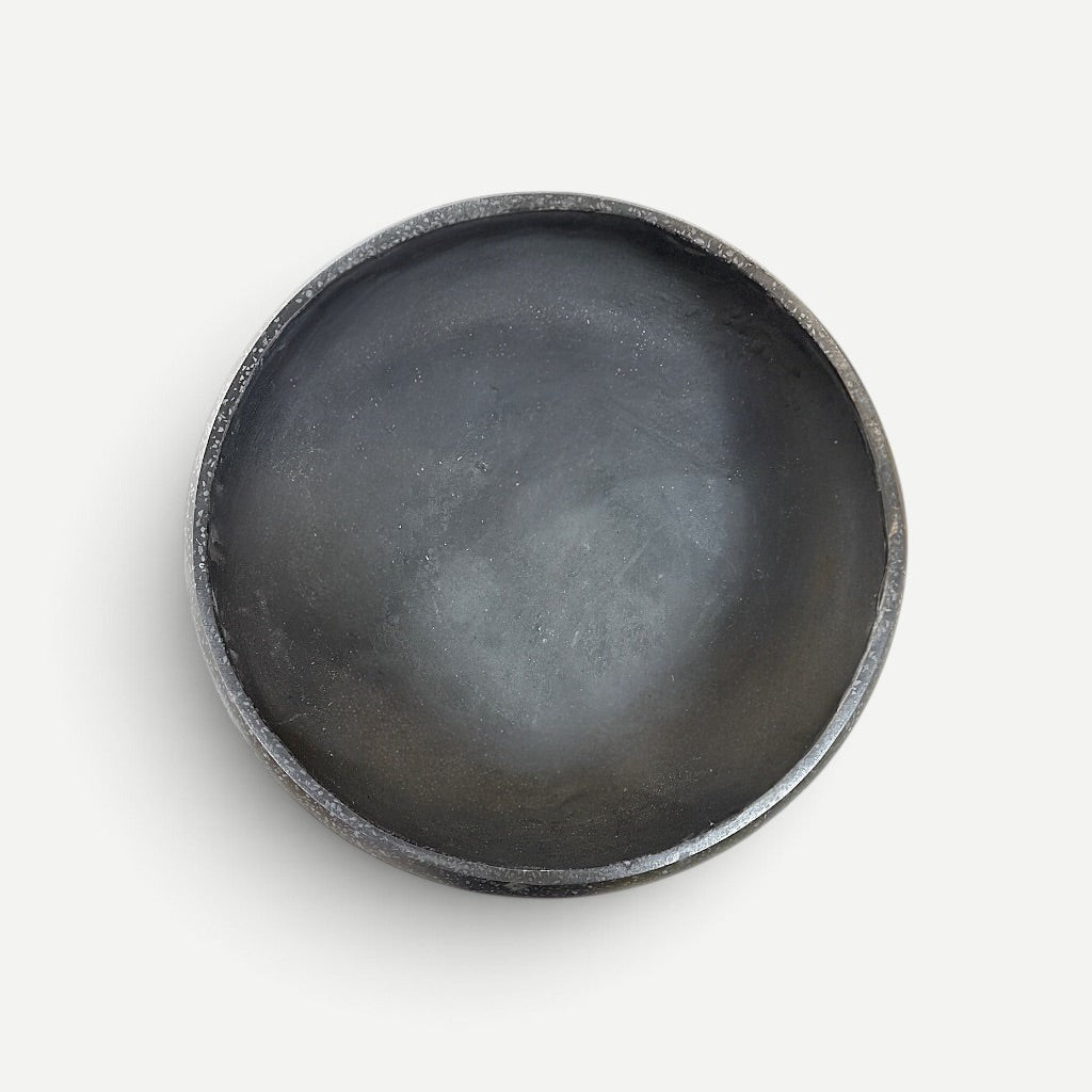 Hawaiian Discovery Furniture Calabash terrazzo planter in a dark grey bowl shape for indoor or outdoor decor.
