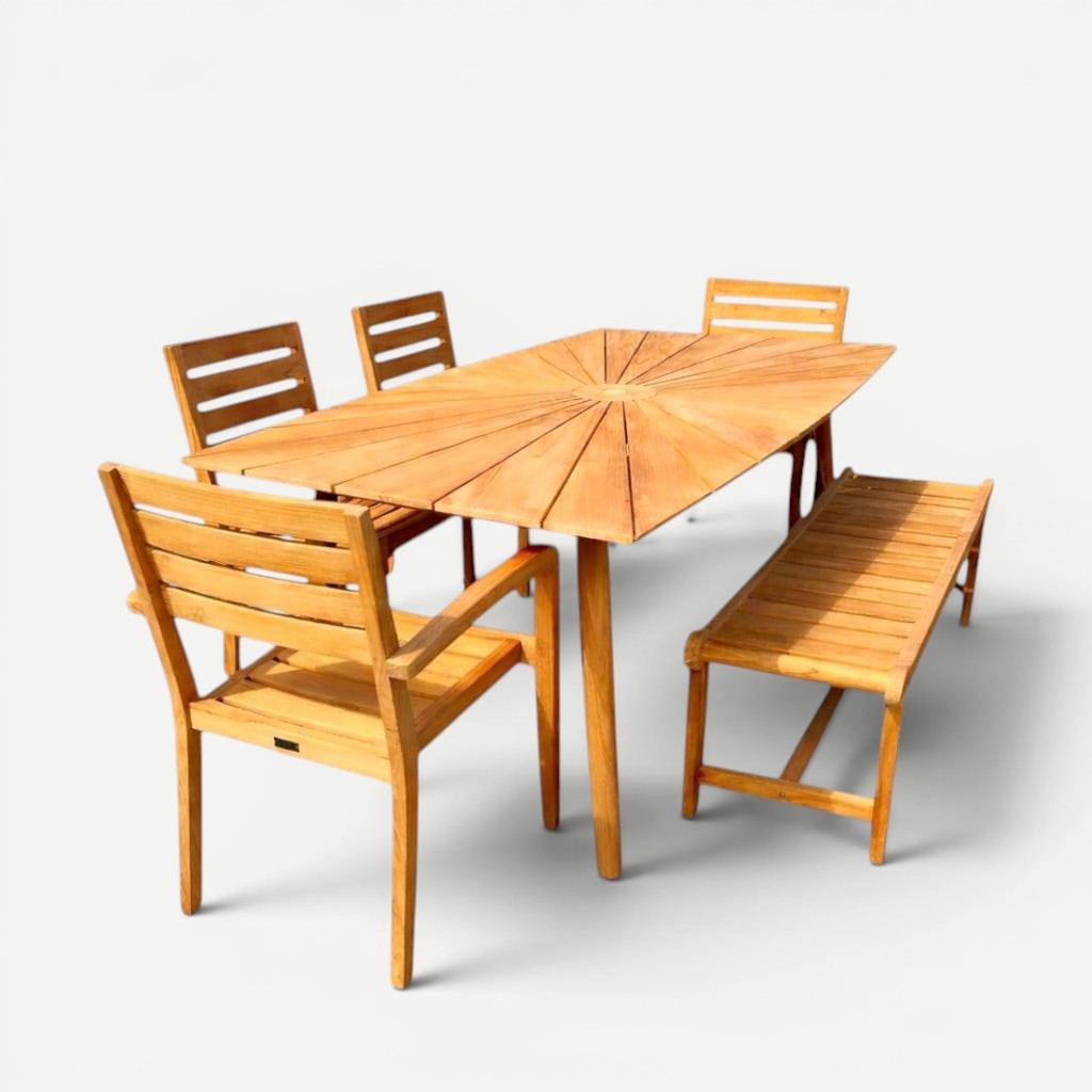Hawaiian Discovery Furniture Cambria teak dining set featuring a boat-shaped table with sunburst pattern and wooden bench