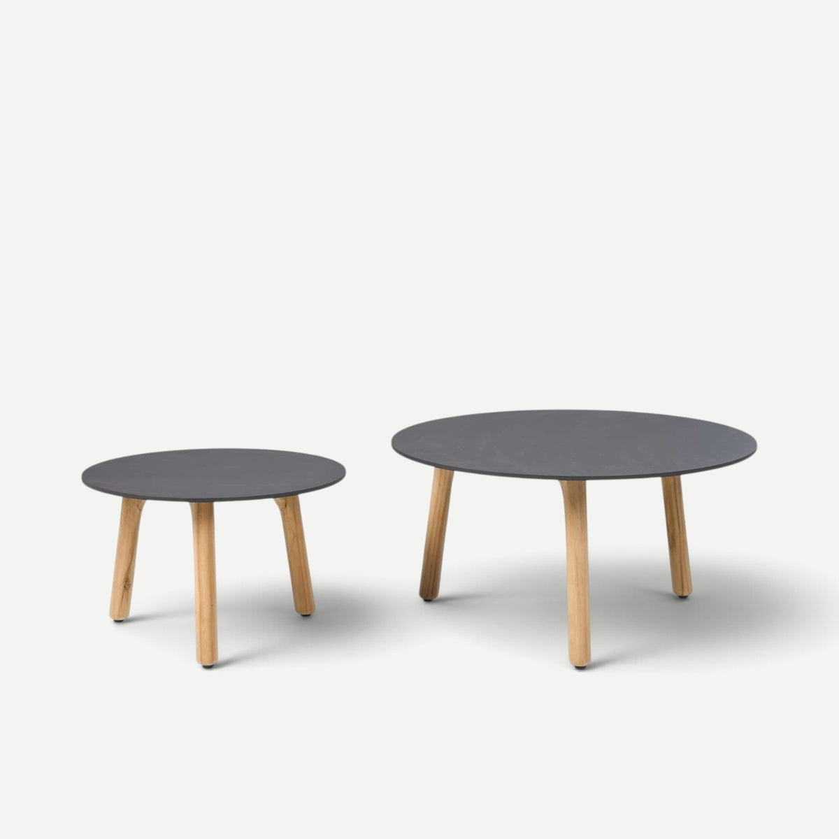 Hawaiian Discovery Furniture Cayman large round side tables with dark grey tops and light wood tripod legs