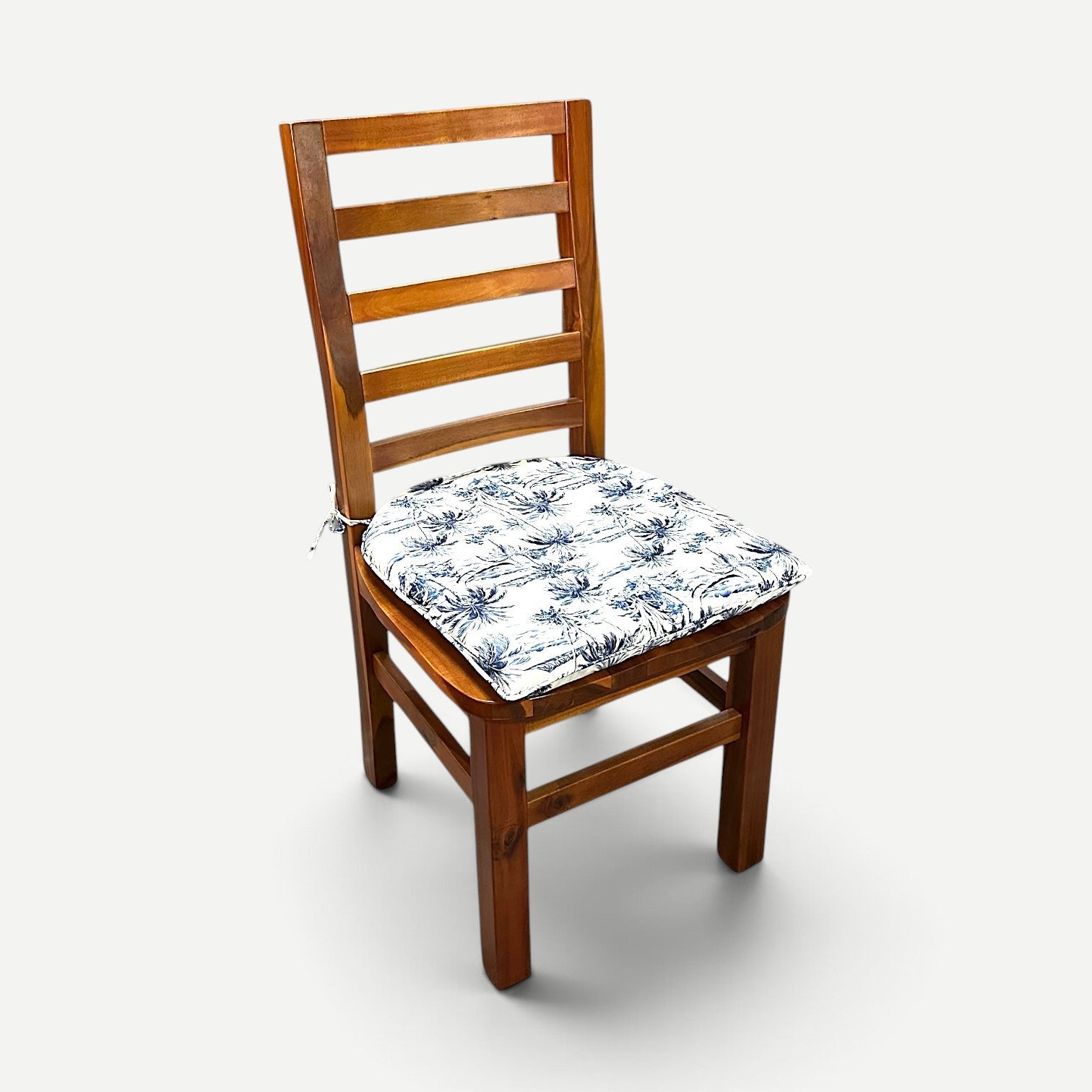 Hawaiian Discovery Furniture Haleiwa dining chair with a blue and white Hawaiian print polyester seat cushion pad