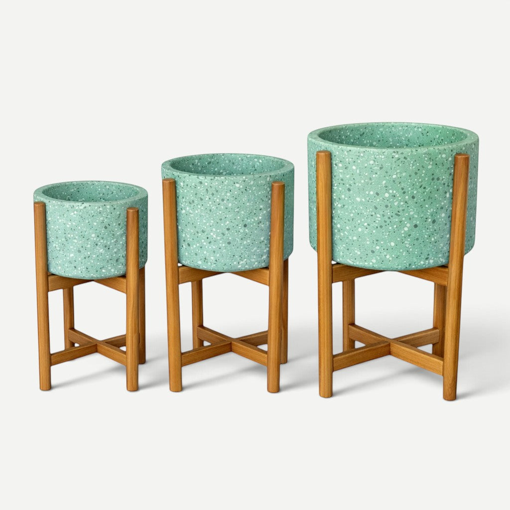 Hawaiian Discovery Furniture set of three mint green terrazzo planters on acacia wood stands for outdoor use