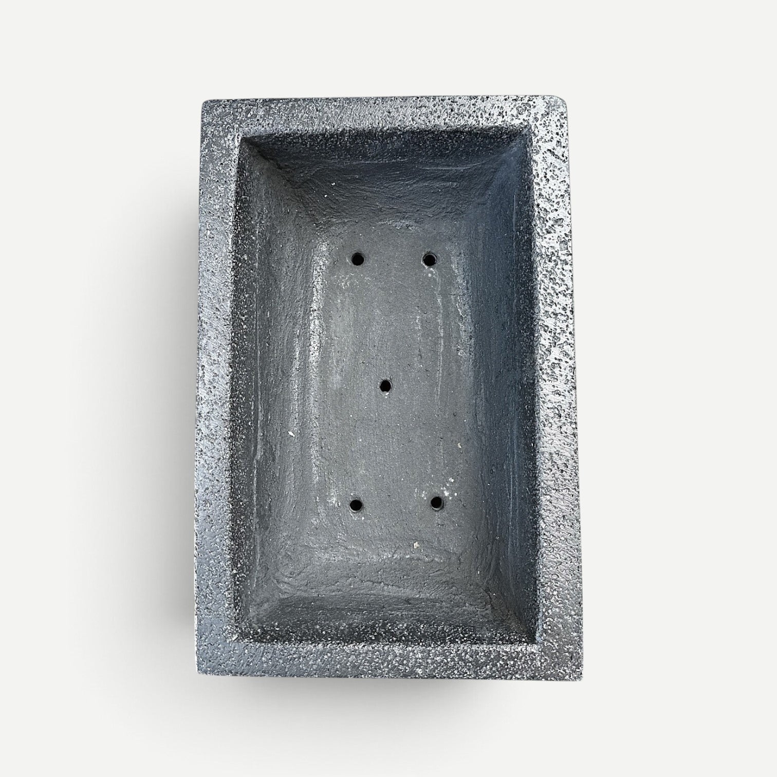 Hawaiian Discovery Furniture rectangular grey bonsai planter with a textured concrete and foam finish and drainage holes
