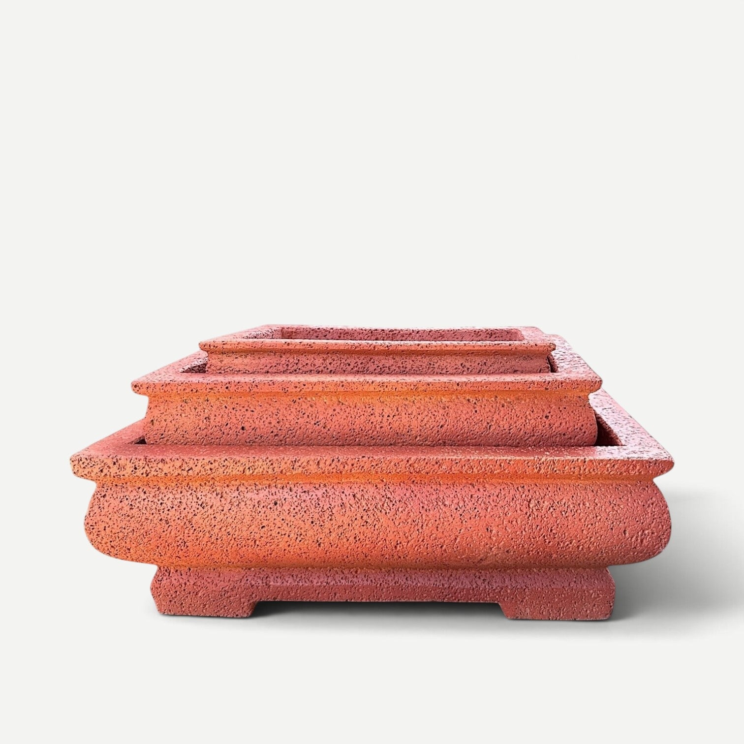 Hawaiian Discovery Furniture Yama rectangular bonsai planter in red, made from lightweight concrete and foam.