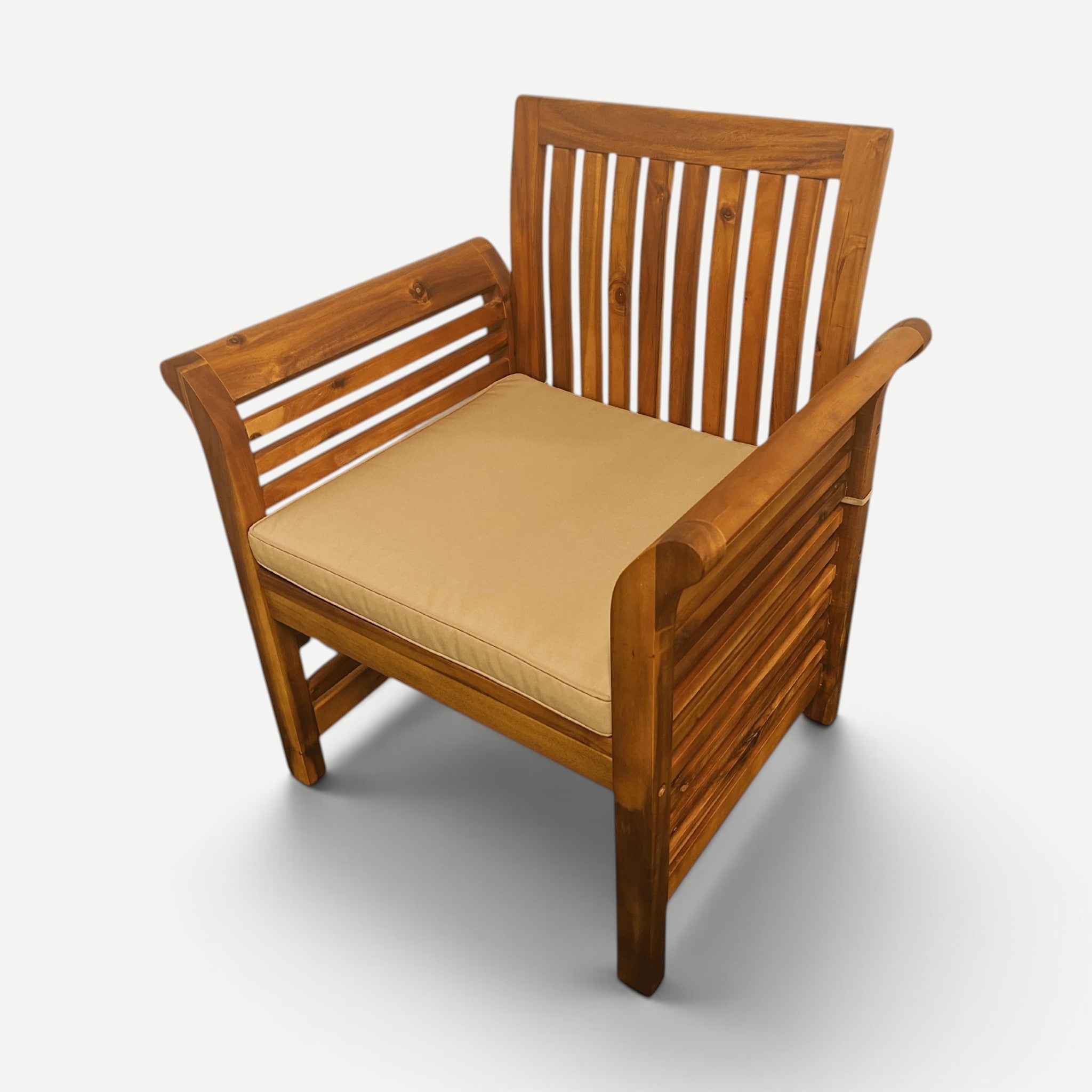 Hawaiian Discovery Furniture 2-inch beige polyester cushion on a wooden Riviera armchair for indoor or outdoor use.