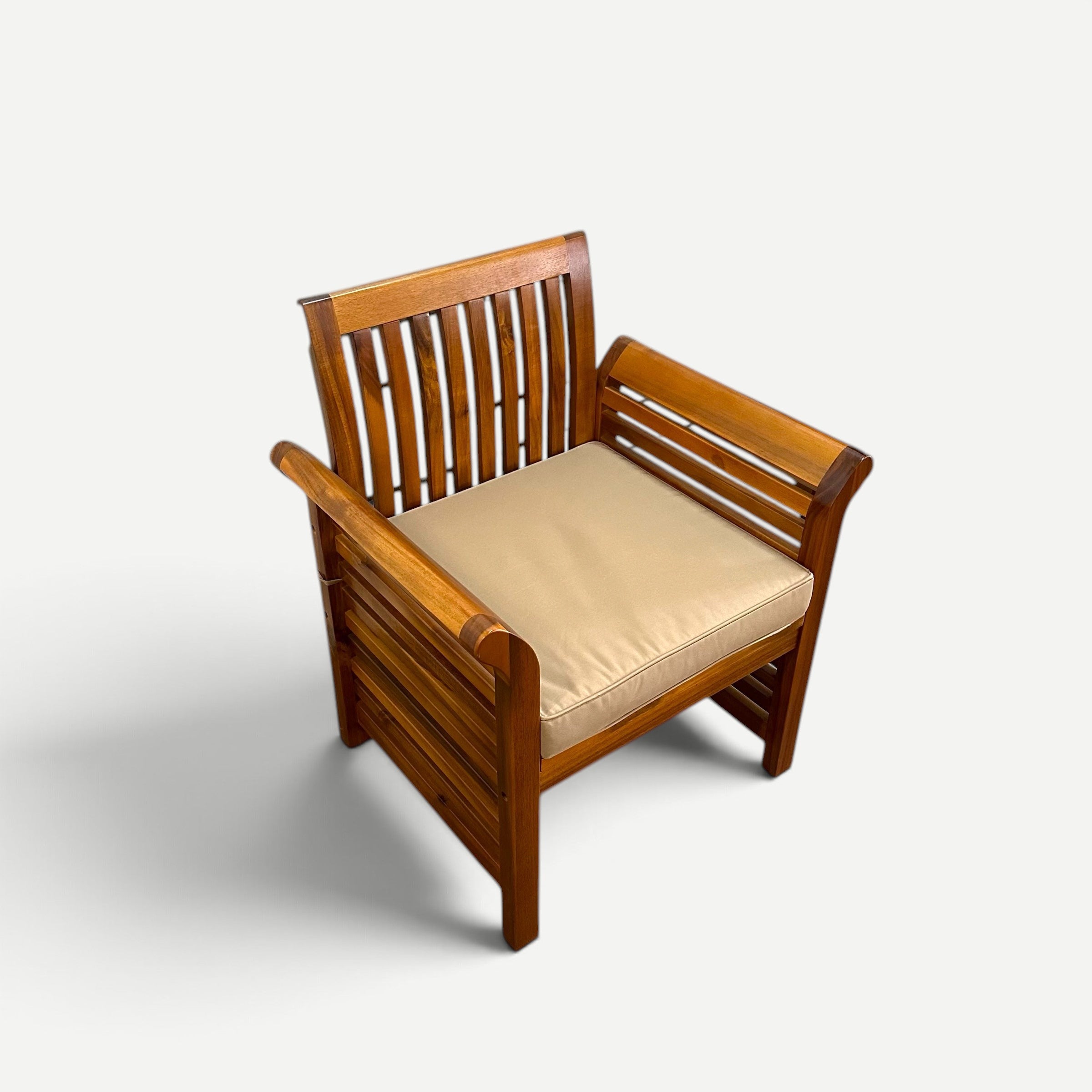 Hawaiian Discovery Furniture Riviera Armchair with a thick 3-inch beige cushion on a wooden frame