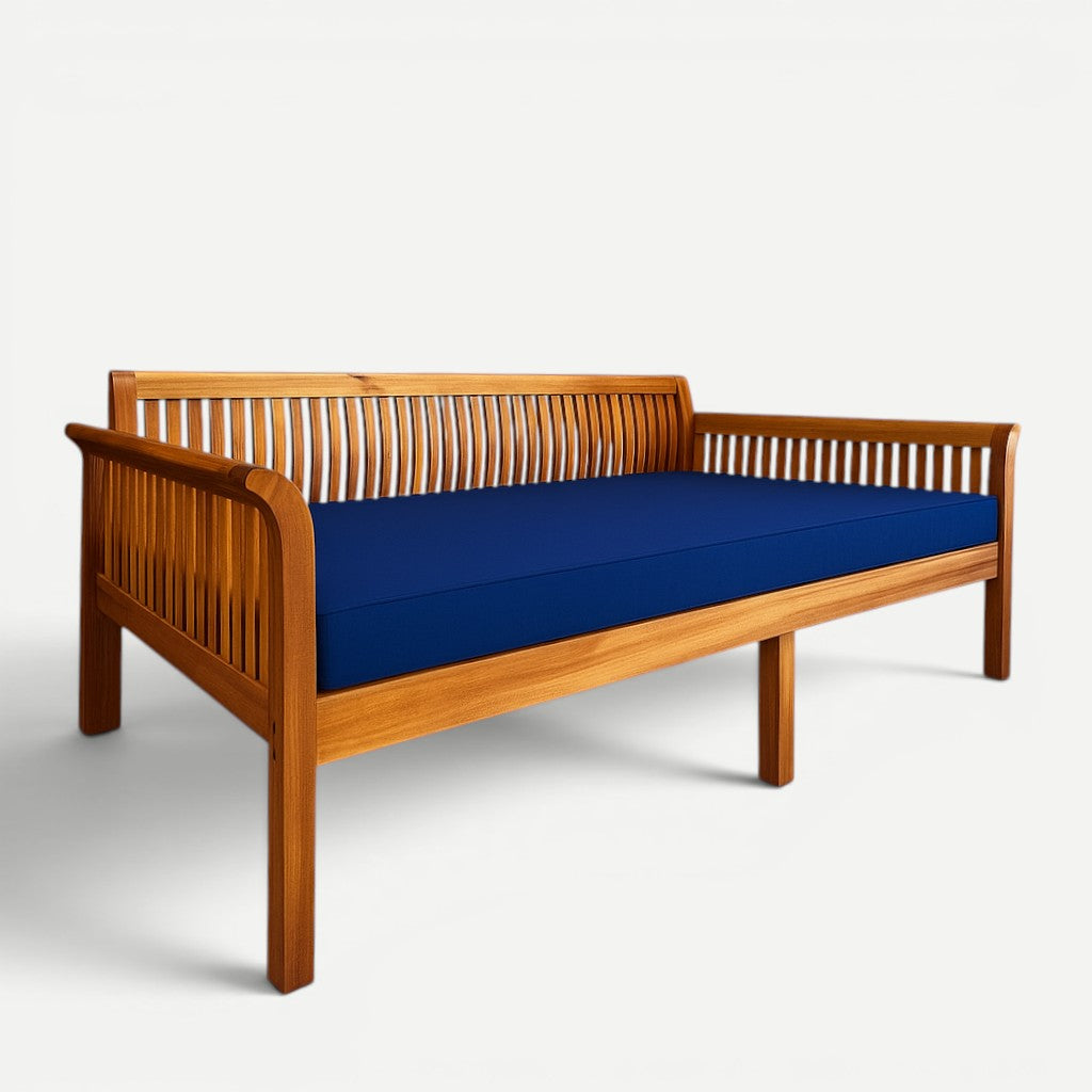 Hawaiian Discovery Furniture Riviera Daybed made of acacia wood with a navy blue twin-size cushion.