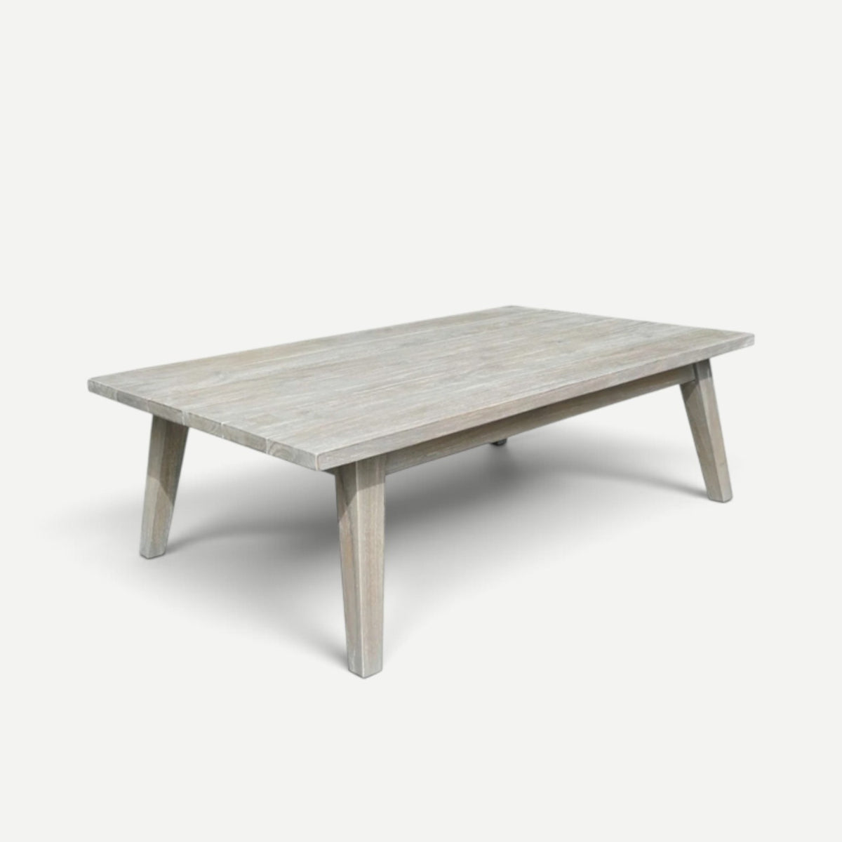 Hawaiian Discovery Furniture Wailele coffee table crafted from weathered teak wood with a low-profile design.
