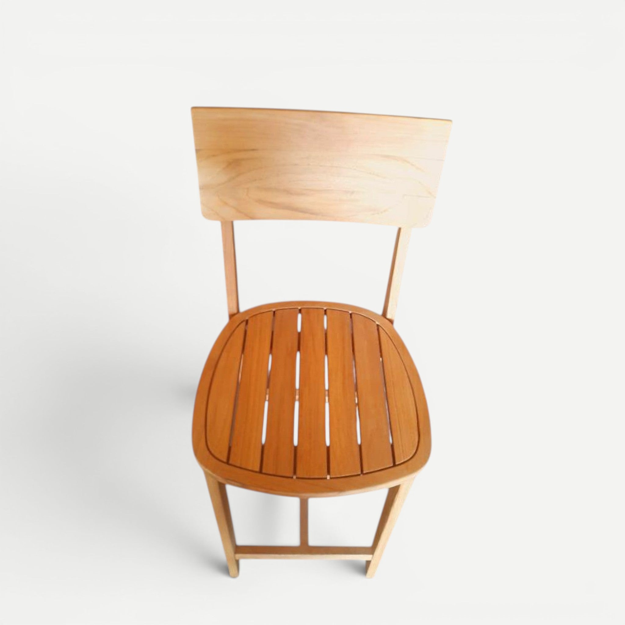 Hawaiian Discovery Furniture Wailuku teak counter stool with a slatted seat and backrest in a natural wood finish.