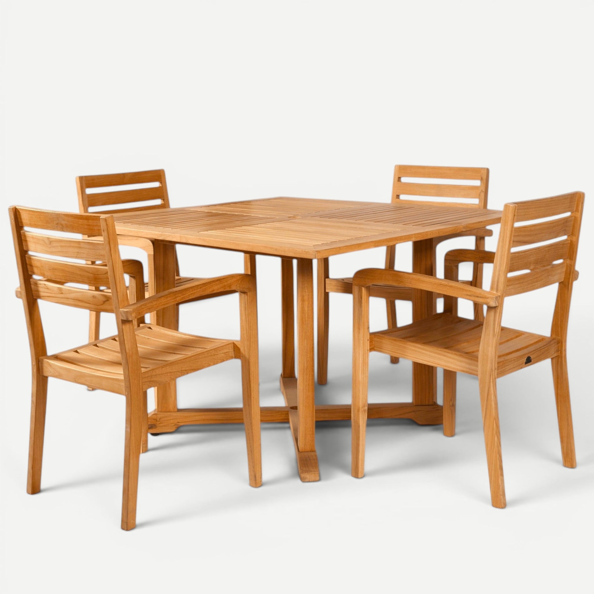 Hawaiian Discovery Furniture Venice teak outdoor dining set with a square table and four arm chairs in natural wood.