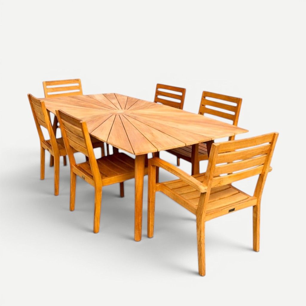 Hawaiian Discovery Furniture Cambria teak dining set with sunburst pattern table and six slatted Venice chairs