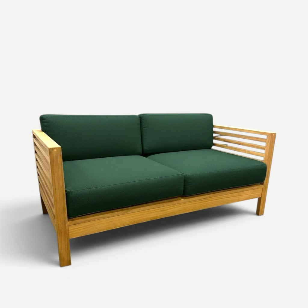 Hawaiian Discovery Furniture Summer Teak Loveseat with natural wood frame and dark green outdoor cushions