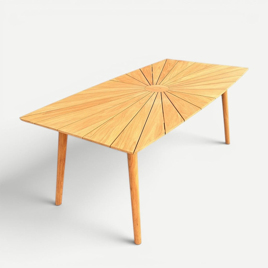 Hawaiian Discovery Furniture Cambria solid teak outdoor dining table with a sunburst pattern top and umbrella hole.