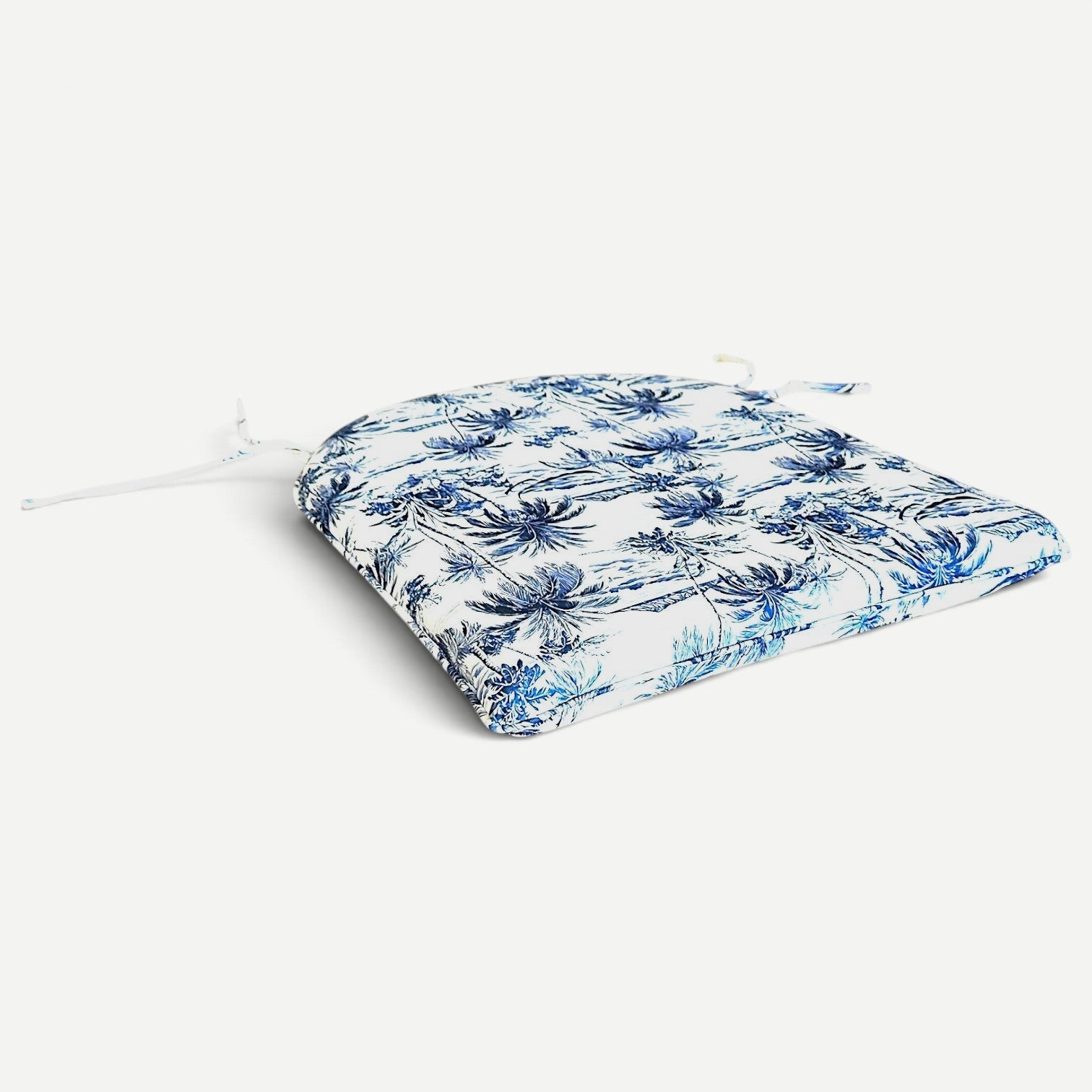 Hawaiian Discovery Furniture polyester chair pad with blue and white tropical palm tree pattern and tie fasteners
