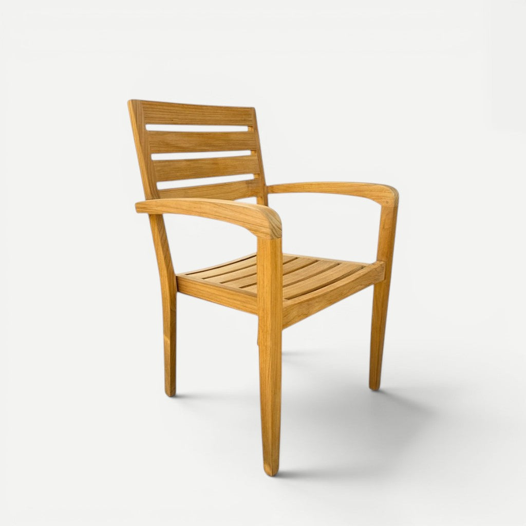 Hawaiian Discovery Furniture Venice teak outdoor arm chair with a slatted back and natural golden wood finish.